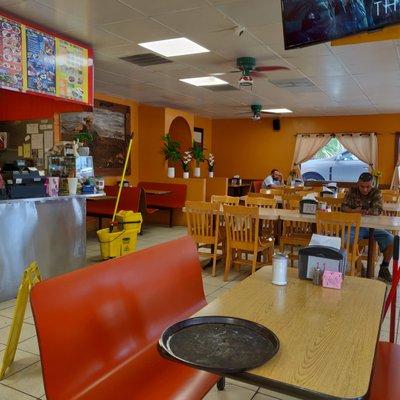 Employees left the Mop bucket out. They should wait until they are closed, instead of cleaning while patrons are dining.