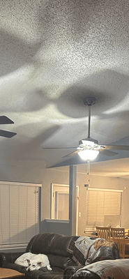 Before photo living room ceiling with popcorn