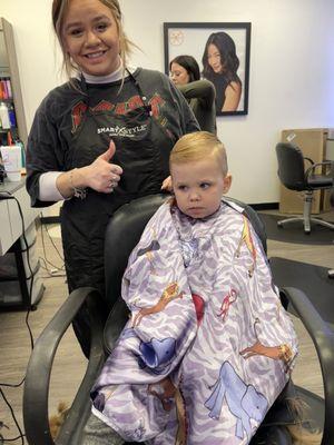 Isn't my grandson handsome Awesome haircut by Katie