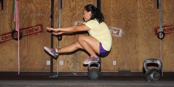 Pistol Squat on a Kettlebell