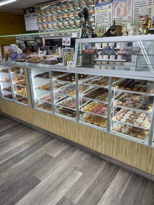 Look at the beautiful donut selection in the display case. I am addicted!