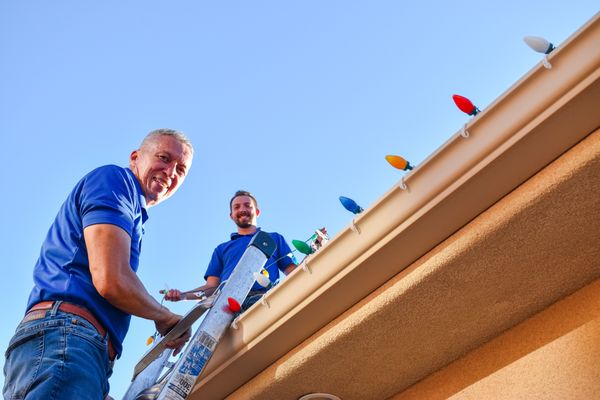 Stuart and Ryan installing lights at a home in the Green Valley area of St. George, Utah