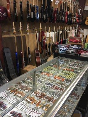 Knives and musical instruments.  Cool store.