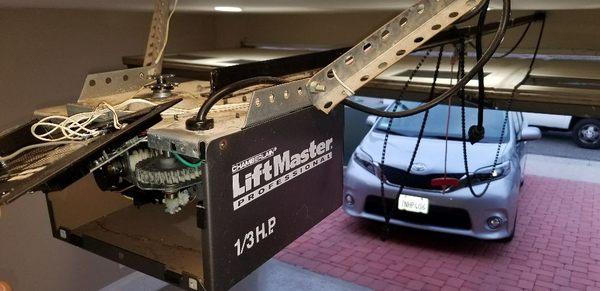 Broken garage door opener. Damaged sprocket on chain drive in Agoura Hills