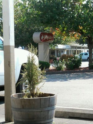 Beside Wendy's - if you miss it, the wendy's lot will connect back for your oil change.