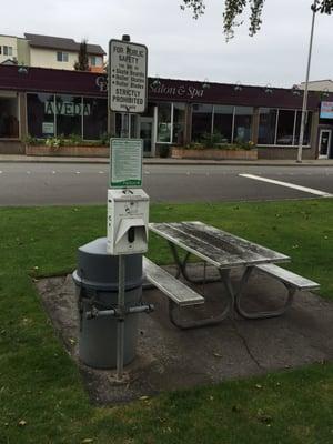 Pet station next to dirty table.