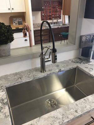 Perfect kitchen faucet! I love the stainless and black it will match my refrigerator.