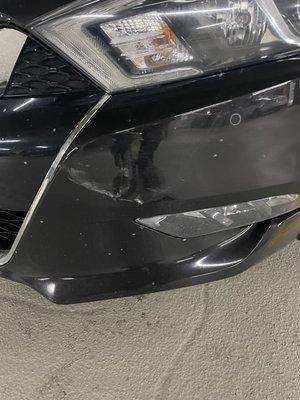 Damaged bumper.