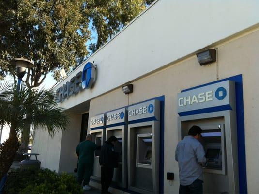 ATM Machines prominently at the Front of the building.