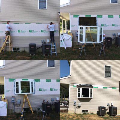 The process of installing a new bay window.