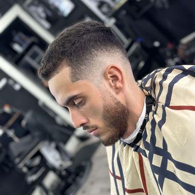 We offer more than just haircuts - we provide a rejuvenating experience. Our master barbers are artisans, meticulously crafting your style.