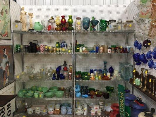 We have this amazing dealer of antique glass in the store- make sure you check it out!