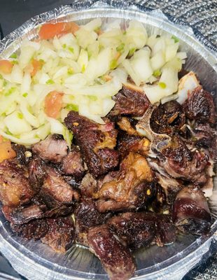 Dibi (Senegalese Grilled lamb) and spicy onions.