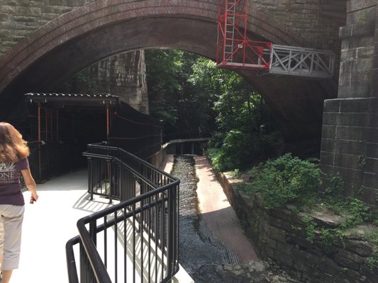 Love the suspended walkway with the nice stream/kill  below