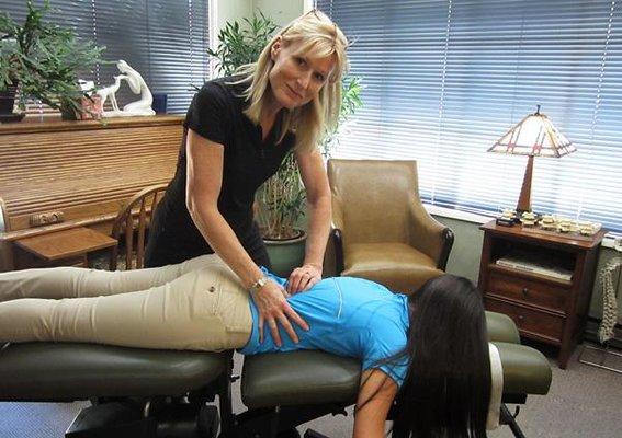 Dr. Sharon provides spinal adjustments using a combination of hand, special table and instruments.