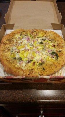 Chicken Florentine pizza - replace tomatoes with banana peppers.  Roma seasoning on crust.  Great stuff.