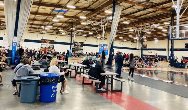 Tables inside facility 8 courts