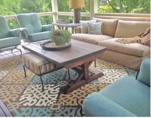 Outdoor screened porch with a beautiful, livable color palette.