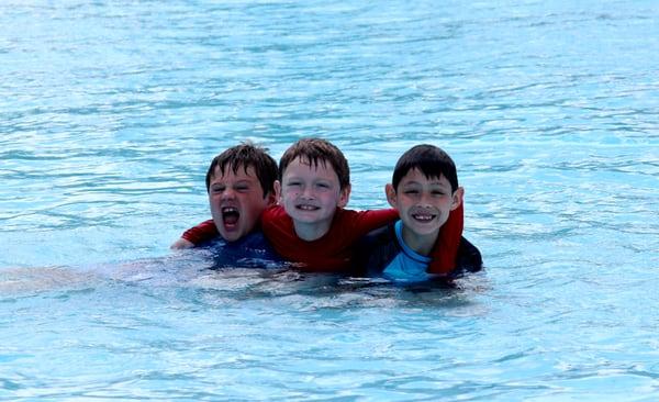 Cooling down in the pool with friends.