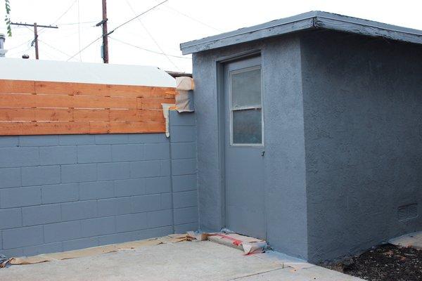 Backyard painting of cement and shed, along with some minor repairs.