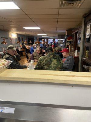 Best place to have breakfast and regulars playing there daily card game which a couple of them have been doing for over 40 years.