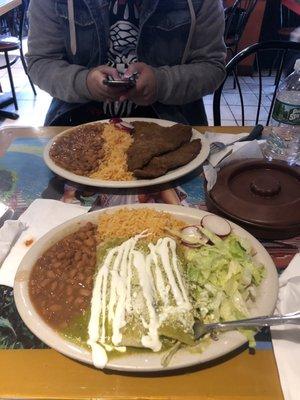 Enchiladas verdes and bistec milanesa (breaded steak) with rice and beans!