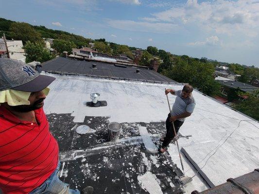 Aluminum coating after new roof instal