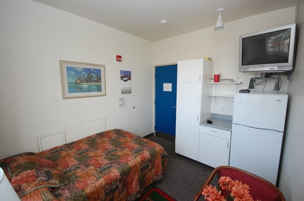 Room with built-in cabinets.