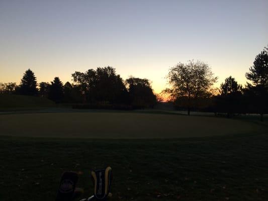 Bright and early.  Looking over the practice green.