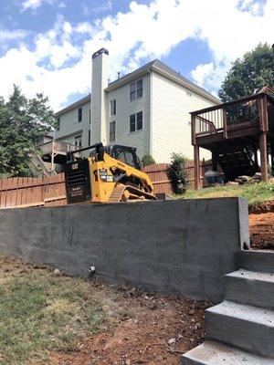 Retaining wall and grading