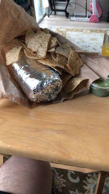 Super burrito, barbacoa, green salsa. Complementary chips( only with the burrito)