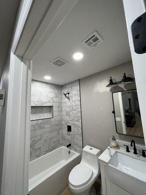 2 recessed lights and vanity light added to bathroom remodel.