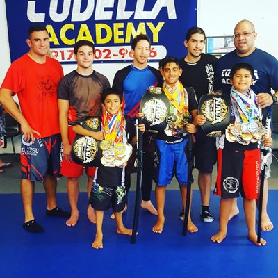 Some of our coaches and some of our young champs!