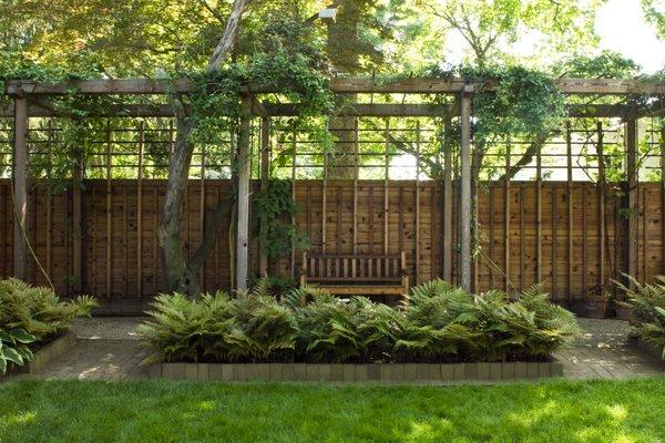 Landscape Architecture: Custom pergola & fence with Autumn Ferns