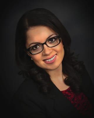 Farah Al-khersan, our trilingual attorney. She speaks both Arabic and Spanish, fluently, in addition to English.