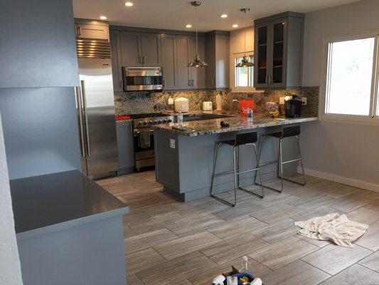 This is a complete condo kitchen remodel, new floors , lighting. Etc