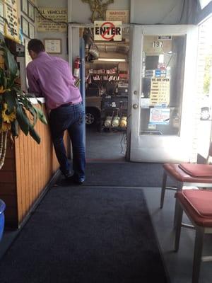 View of customer paying a bill in the lobby