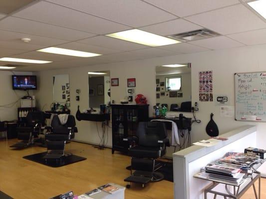 Nice comfortable chairs and a TV to stay updated on sports or the latest news during your haircut.