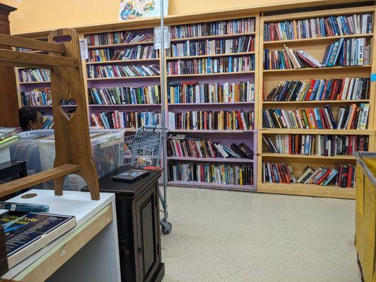 Book shelves in the far left corner.