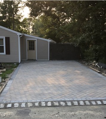 Brand new paver driveway for a happy customer.