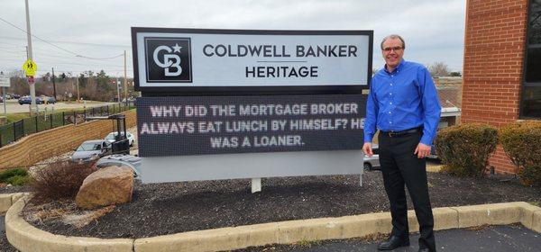 David Campbell standing in front of the new Coldwell Banker Heritage Office.