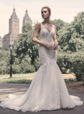 Beaded fit and flare wedding dress with sparkling details