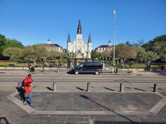 K's Van ready for pick up in front  of Jackson Square & St. Louis Cathedral