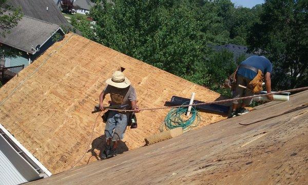 Working on a tall, steep roof in Phoenix Hills subdivision.