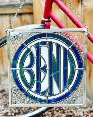 Bend Sign in blue green color. Stained Glass Overlay.