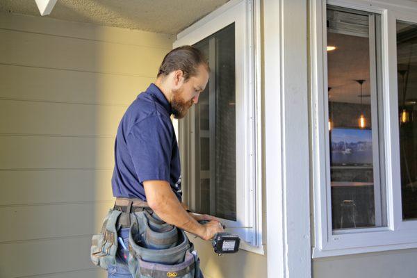 Campbell Security Window Screens being installed on a home in Huntington Beach, CA.