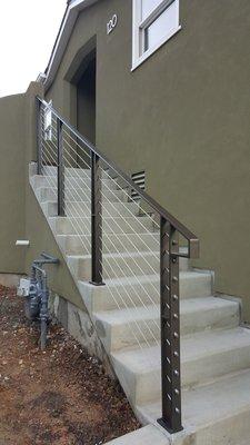 Handrails with stainless steel cables.