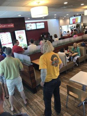 One cashier and 20 people in line. You've got two cash registers, next time you need to use them. It's called a lunch rush for a reason.