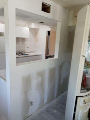 Drywall repair and new drywall installation