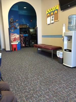 Videos games.   Gotta love a dentist office with video games